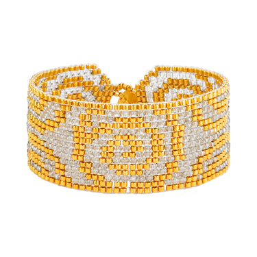 Brazalete Telar Dorado Medio Espirales Gris Traslúcido
